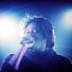 rapper danny brown sings into microphone at 2013 beacons festival