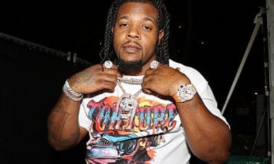 rapper rowdy rebel holding chains at made in america festival