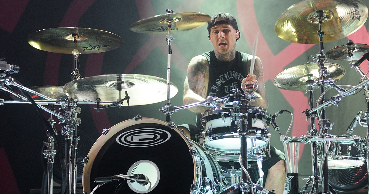 musician travis barker plays drums for blink 182 