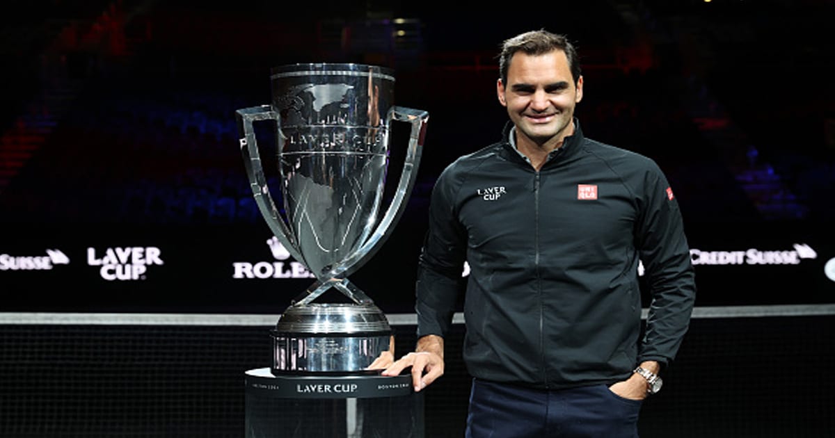  Roger Federer poses for a photograph with the Laver Cup Trophy