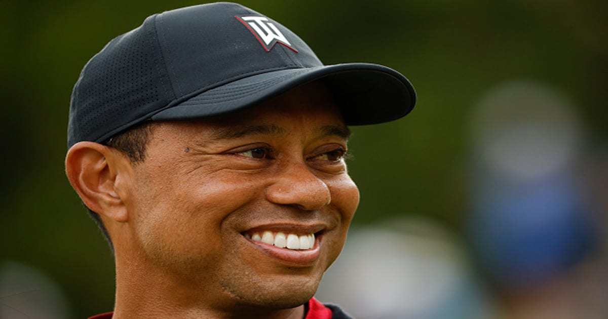 richest athletes Tiger Woods, tournament host, smiles during the trophy ceremony 