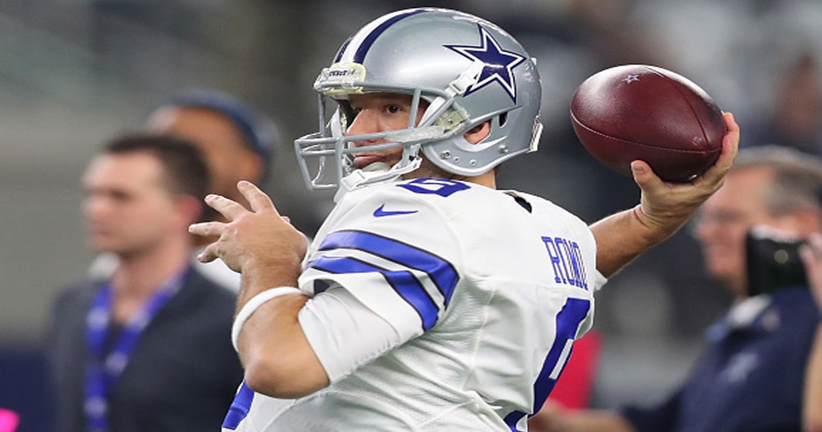 Tony Romo #9 of the Dallas Cowboys warms up on the field