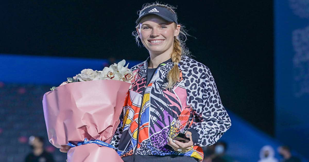 richest wta players Caroline Wozniacki of Denmark poses after competing against Winner Kim Clijsters