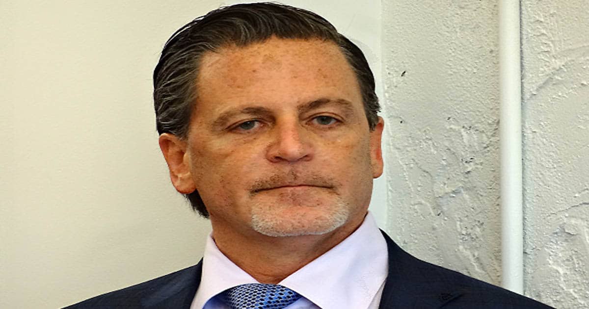 Portrait of American businessman Dan Gilbert in his office