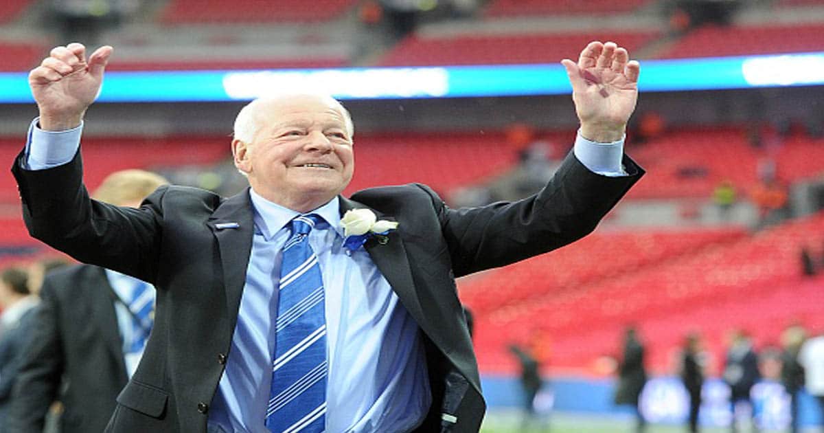 richest soccer players Dave Whelan celebrates on the pitch following their victory over Manchester City