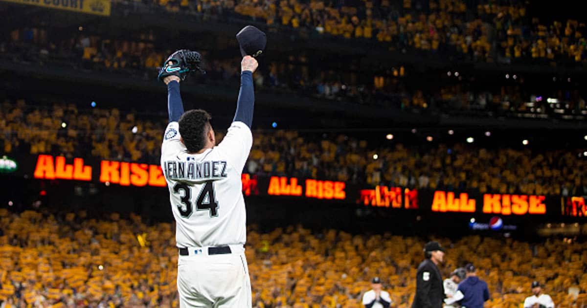 Felix Hernandez #34 of the Seattle Mariners acknowledges cheering fans as he is taken out of the game