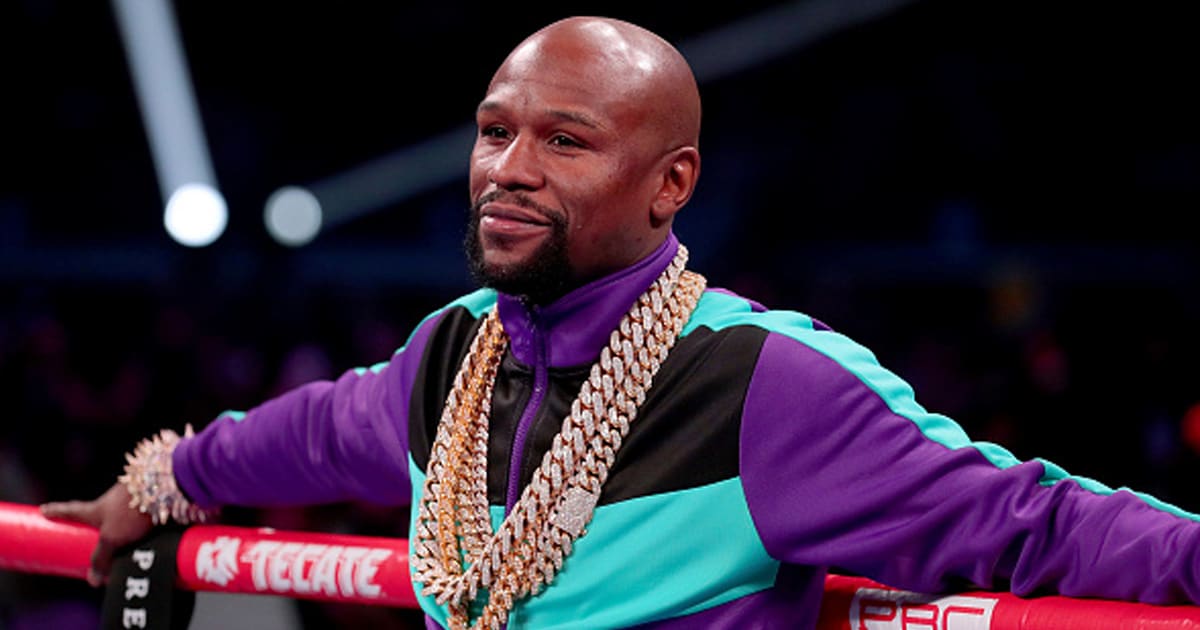 Floyd Mayweather Jr. stands in the ring before Errol Spence Jr takes on Mikey Garcia