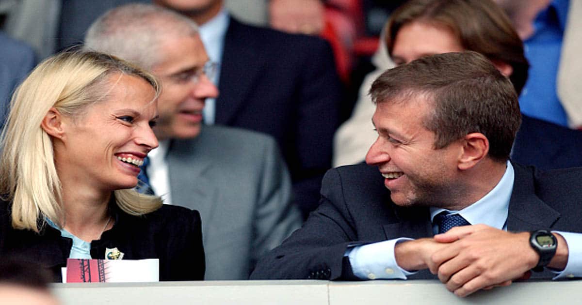 Chelsea owner Roman Abramovich laughs with wife Irina