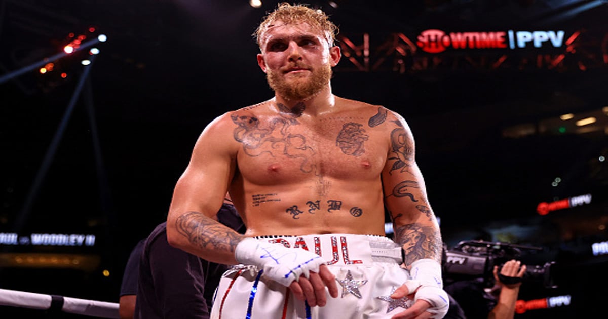 Jake Paul reacts to knocking out Tyron Woddley in the sixth round 