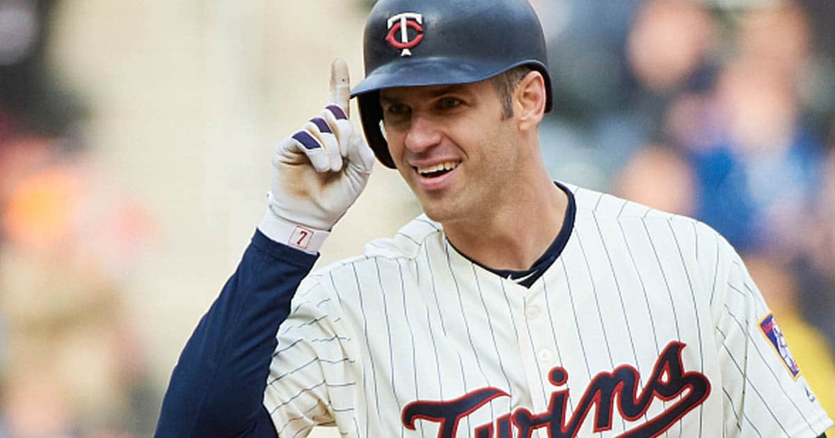 Joe Mauer #7 of the Minnesota Twins celebrates a double against the Chicago White Sox