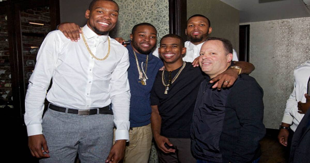 Kevin Durant, Chris Paul and Leon Rose are seen during NBA All-Star Weekend 2014