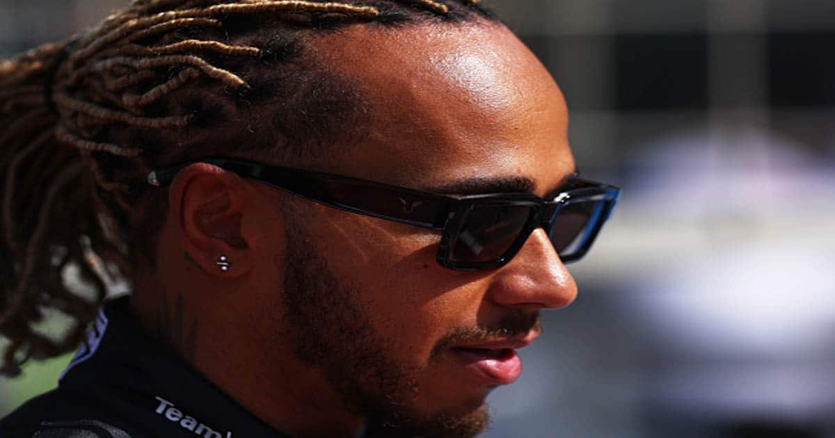 richest race drivers Lewis Hamilton of Great Britain and Mercedes looks on  