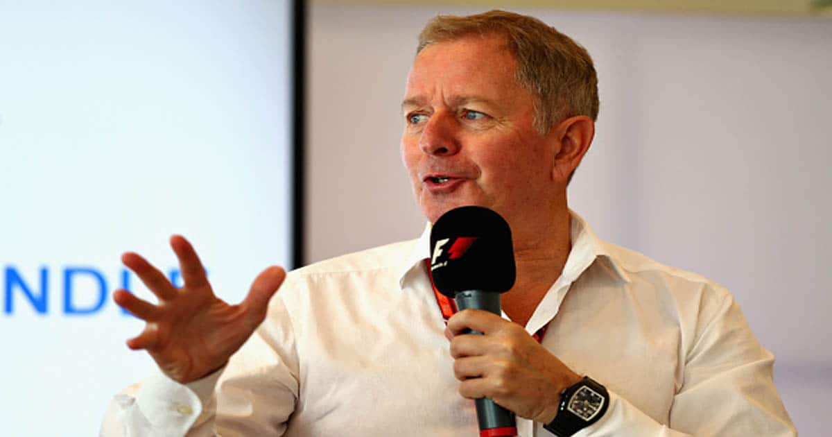 Martin Brundle talks on stage during the F1 Connectivity Innovation prize giving