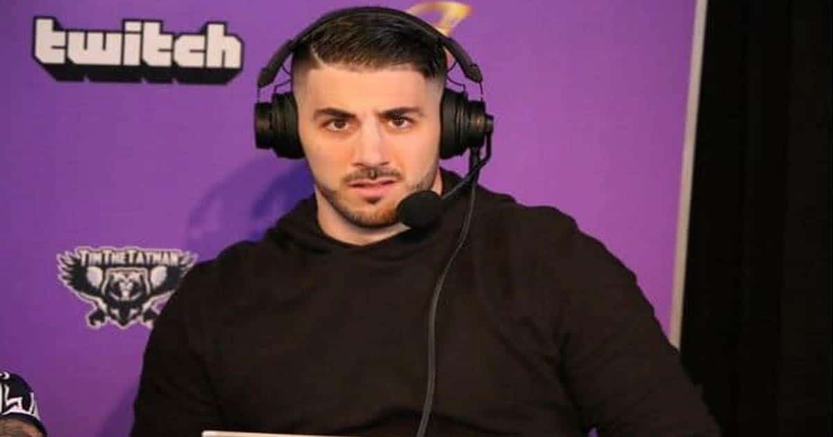 richest twitch streamers nickmercs poses in front of purple background