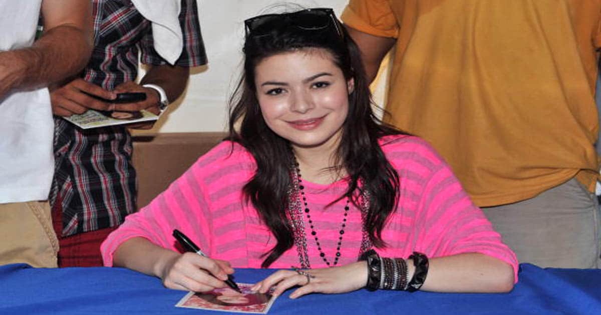 Actress Miranda Cosgrove signs autographs backstage at The Country Fair Entertainment Park