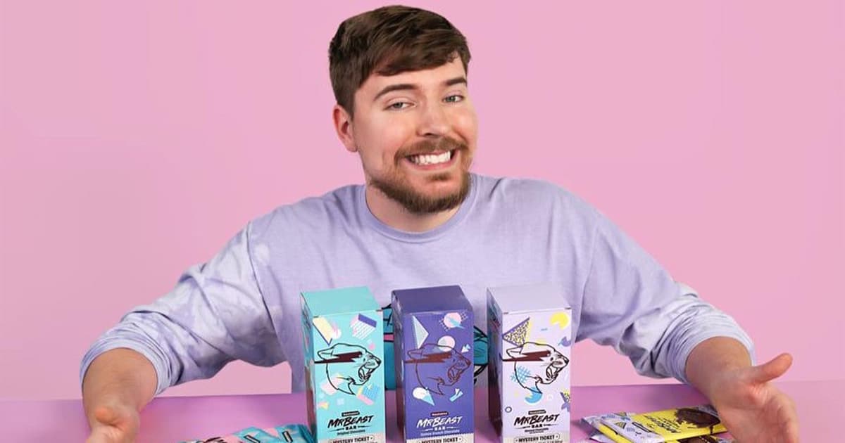 youtuber mrbeast poses with products