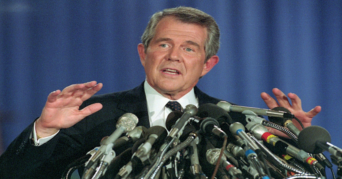 evangelist pat robertson responds to questions during a news briefing