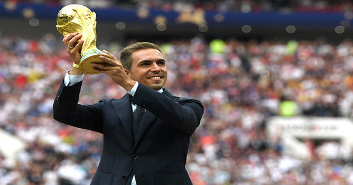 Philippe Lahm holds the World Cup trophy during closing ceremony prior to the 2018 FIFA World Cup 