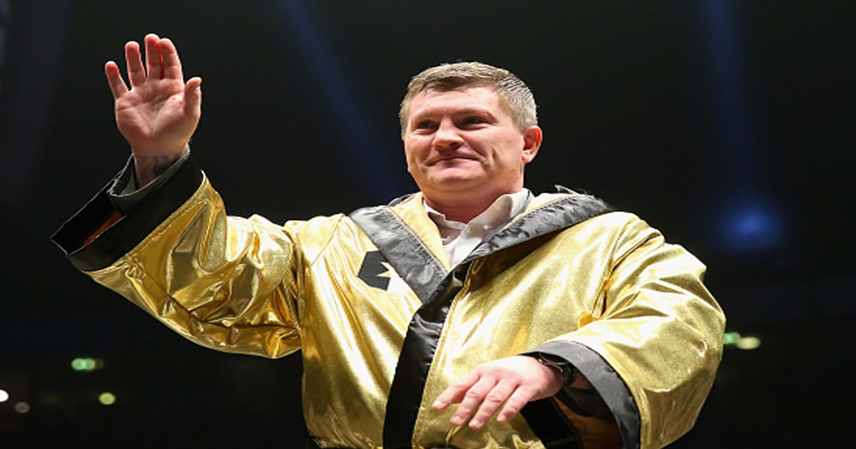 richest boxers Ricky Hatton, is introduced to the crowd wearing the gold gown 