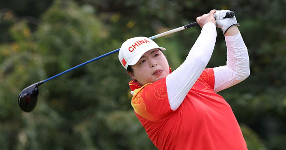 Shanshan Feng of Team China plays her shot from the eighth tee 