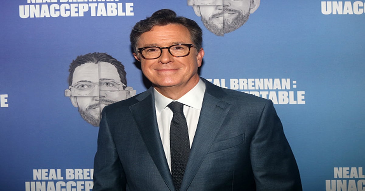 Stephen Colbert poses at the opening night arrivals for "Neal Brennan's Unacceptable"