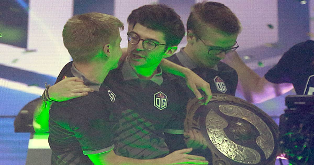 richest dota 2 players Topias Taavitsainen (R) of OG holds the Aegis of Champions trophy 