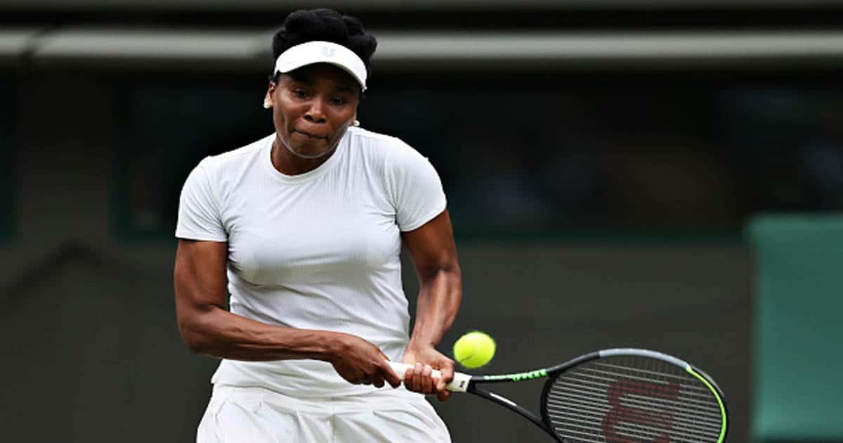 Venus Williams of The United States plays a backhand in her Ladies' Singles Second Round match