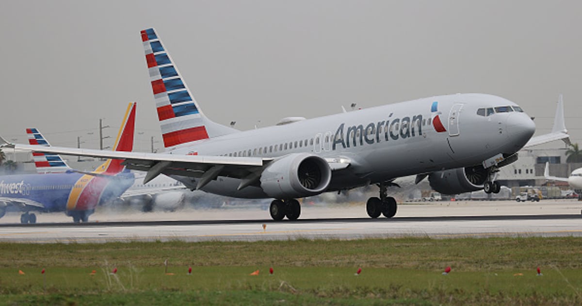 An American Airlines plane lands at the Miami International Airport