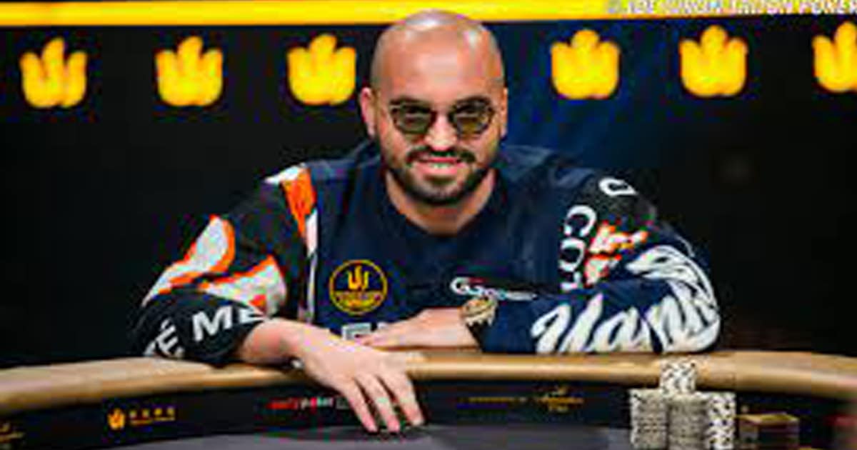 high stakes poker player bryn kenney sits at poker table