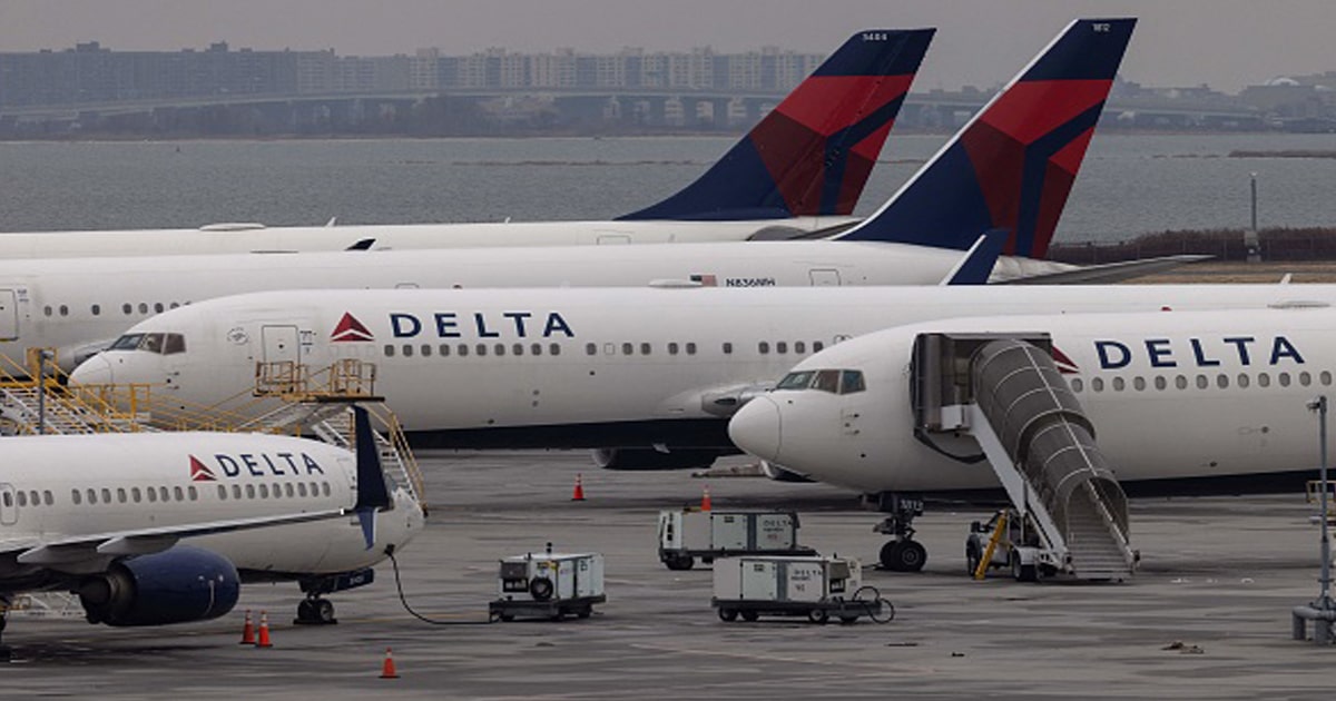 Delta Airlines passenger aircrafts are seen on the tarmac of John F. Kennedy International Airpot