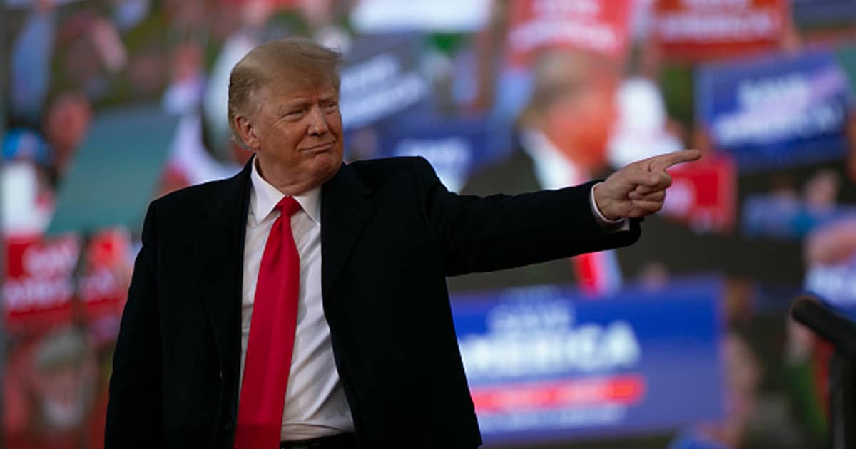 Former U.S. President Donald Trump speaks at a rally at The Farm at 95