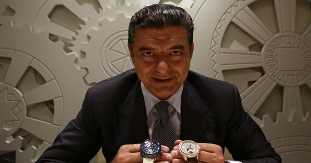 Jacob Arabo poses for a photograph with Caviar Tourbillon wristwatches 