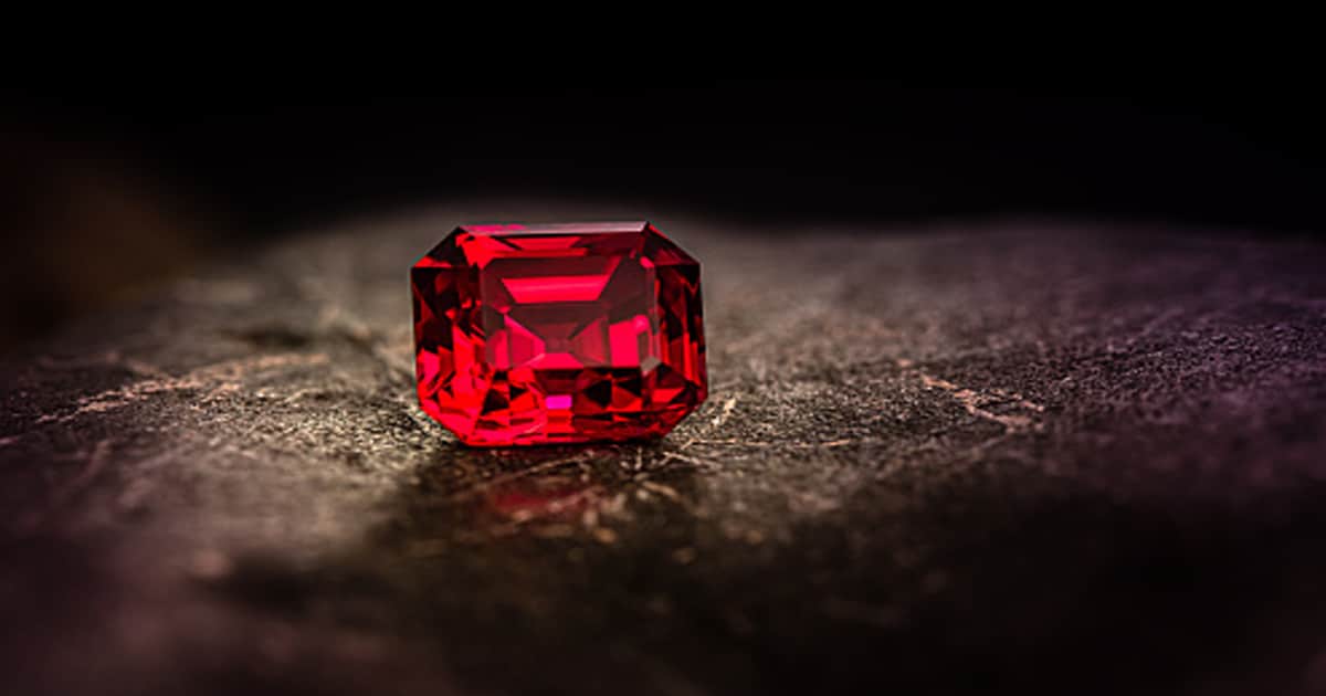 Close-up of ruby gemstone on dark background