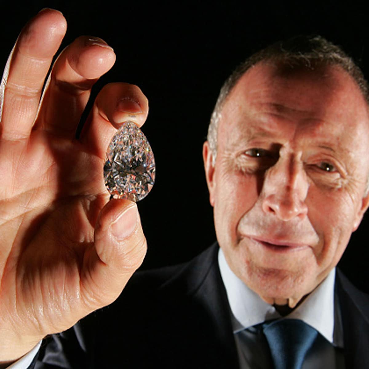 Laurence Graff, Chairman of Graff Diamonds holds `Lesotho Promise Number One`, the largest of 26 flawless diamonds cut