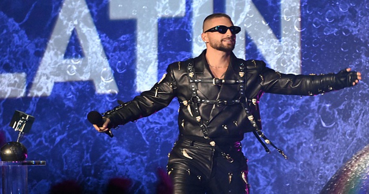 Maluma celebrates on stage during the MTV Europe Music Awards 