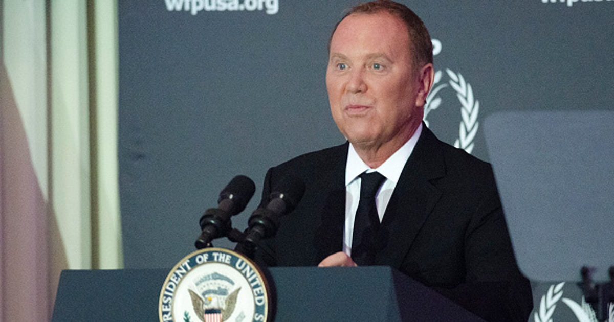 Fashion designer Michael Kors speaks after being presenting an award by Vice President Joe Biden