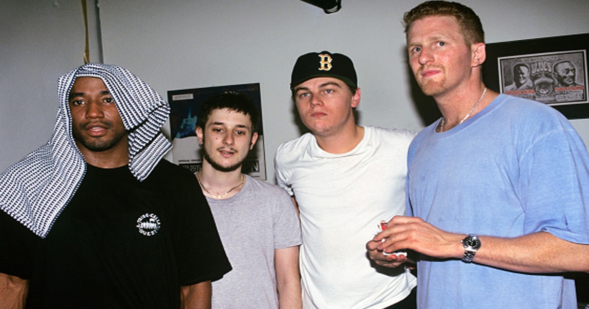 (L to R) Q-Tip, Harmony Korine, Leonardo Dicaprio and Michael Rappaport backstage at A Tribe Called Quest show