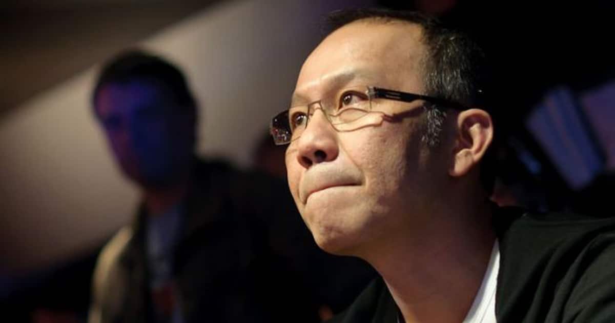 richest poker players paul phua stares on as he sits at table