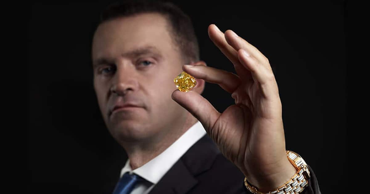 richest jewelers robert mouawad holds solid gold rock