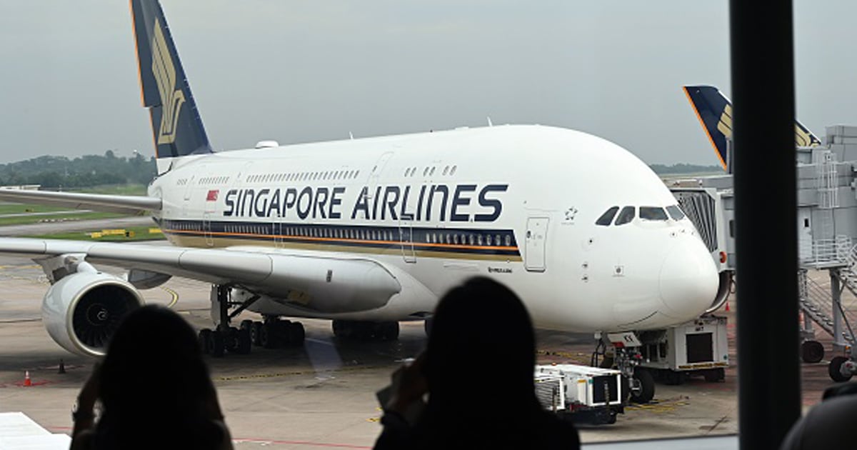 A Singapore Airlines Airbus A380 plane is seen parked on the tarmac at Changi International Airport 