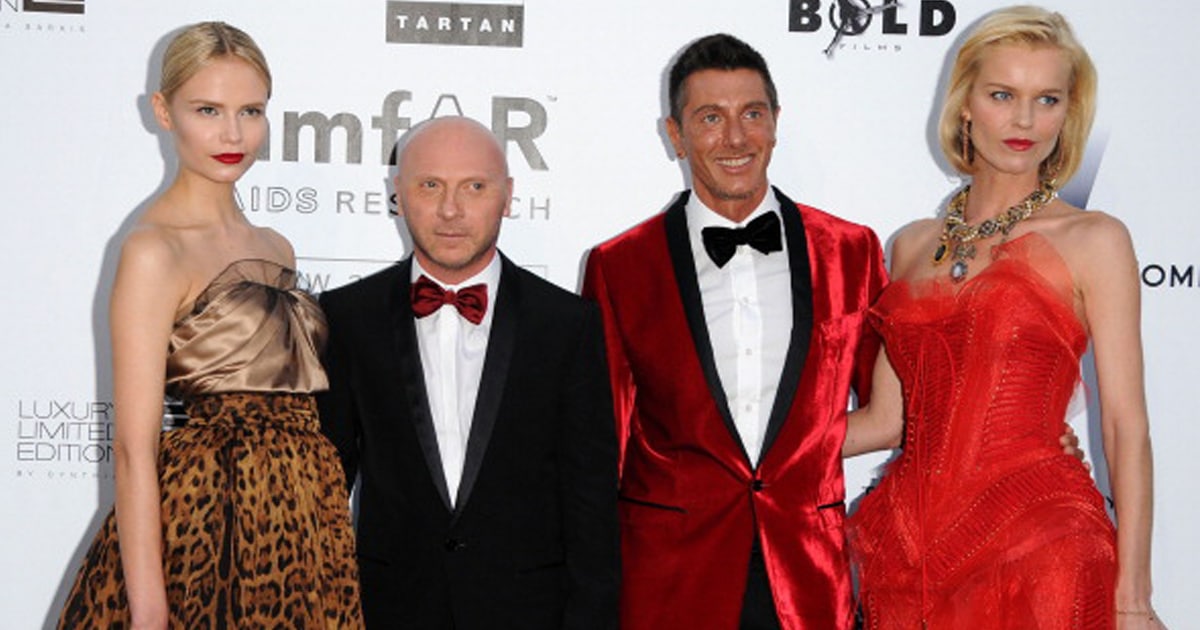 Domenico Dolce, Stefano Gabbana and Eva Herzigova (R) attends the amfAR Cinema Against AIDS 2009 benefit