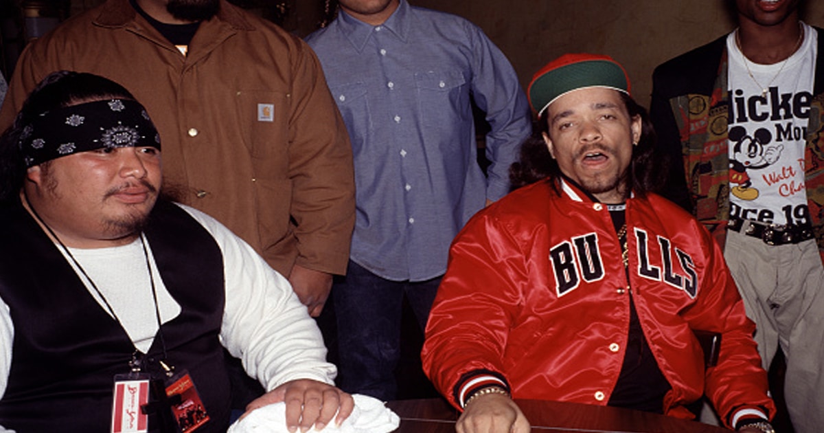 Ice-T (born Tracy Marrow) (in red Bulls jacket) poses with unidentified others at the MK Club