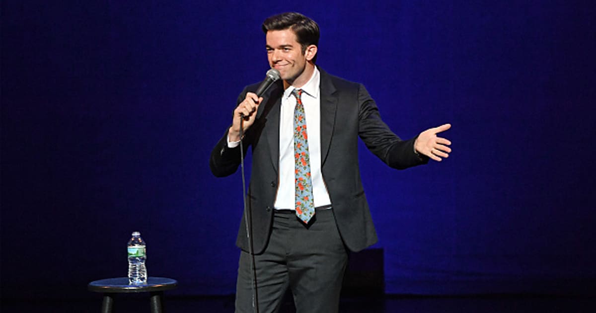 John Mulaney performs onstage during Gaffigan, Mulaney & Birbiglia Stand Up for Georgetown