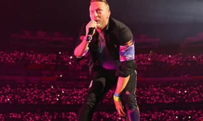 Chris Martin of Coldplay performs onstage during their "Music of the Spheres" tour