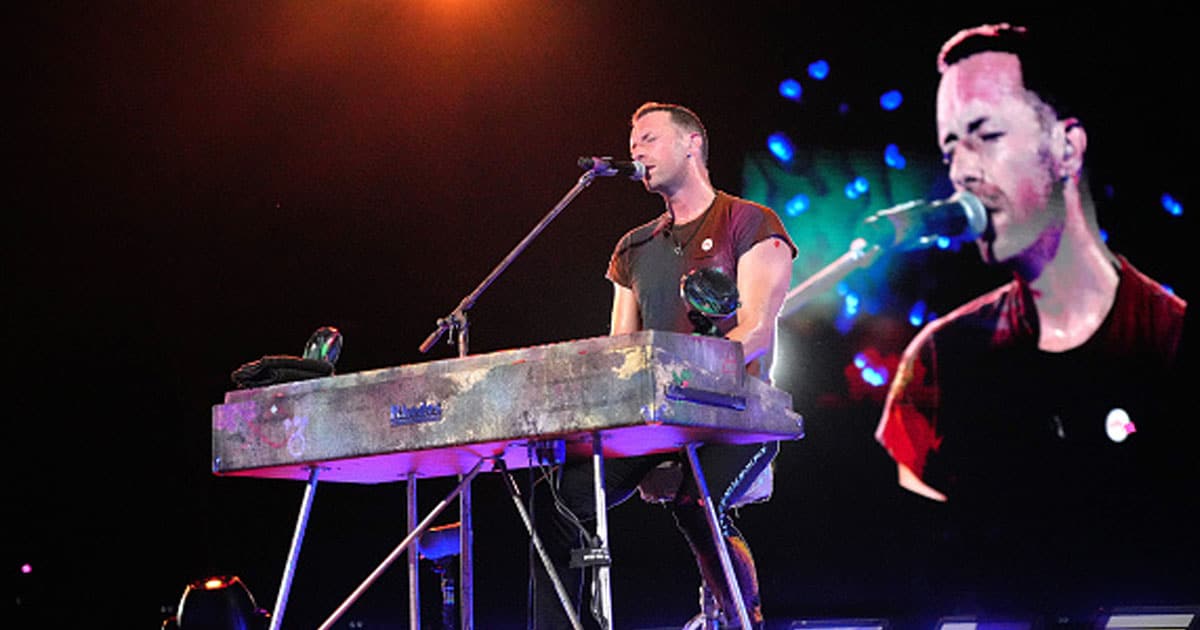 Chris Martin of Coldplay performs onstage during their "Music of the Spheres" tour