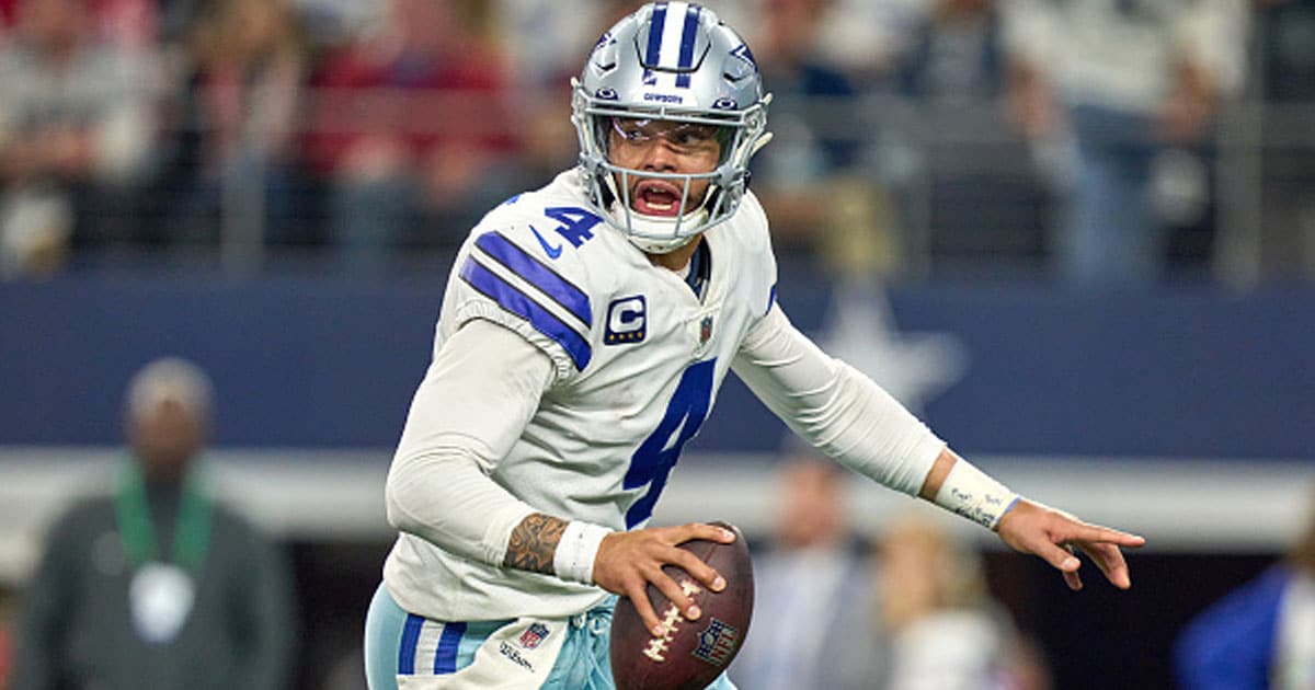 Dak Prescott (4) runs with the football during the NFC Wild Card game between the San Francisco 49ers and the Dallas Cowboys