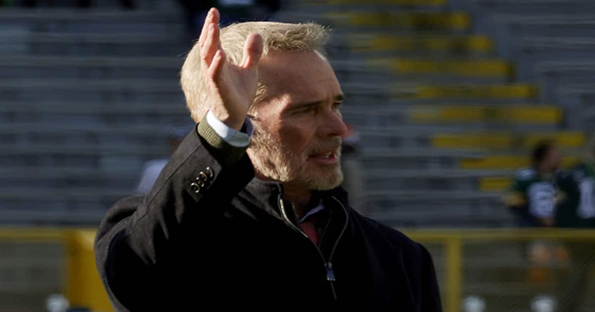 SportscasterJoe Buck waves to fans before the game between the Cleveland Browns and the Green Bay Packers