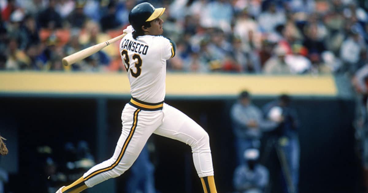 Jose Canseco #33 of the Oakland Athletics swings at the pitch during a 1986 season game 