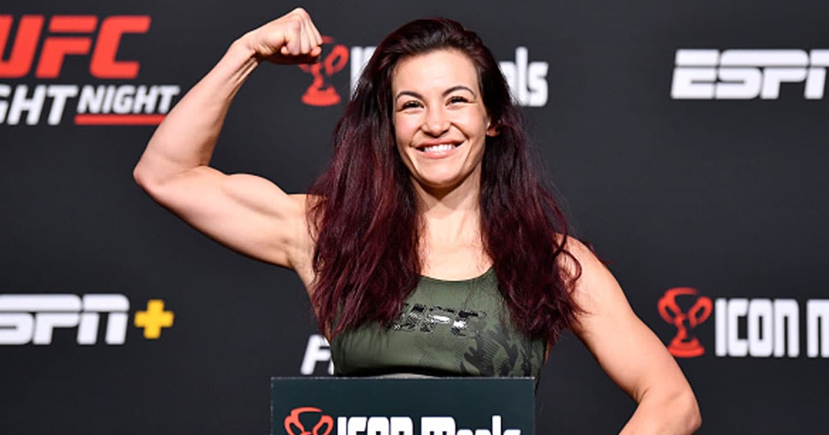  Miesha Tate poses on the scale during the UFC Fight Night weigh-in