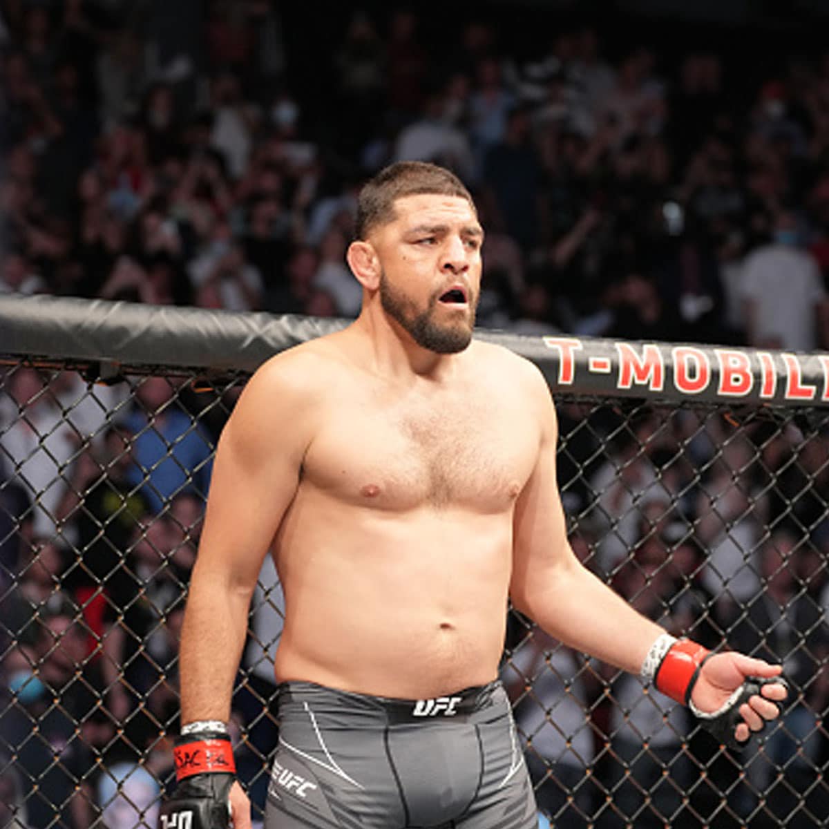 Nick Diaz enters the Octagon in his middleweight fight during UFC 266